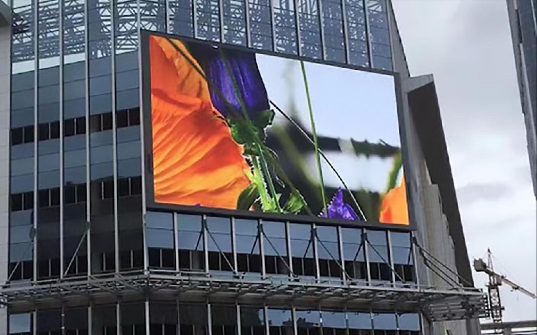 Large outdoor fixed LED screen on a building façade